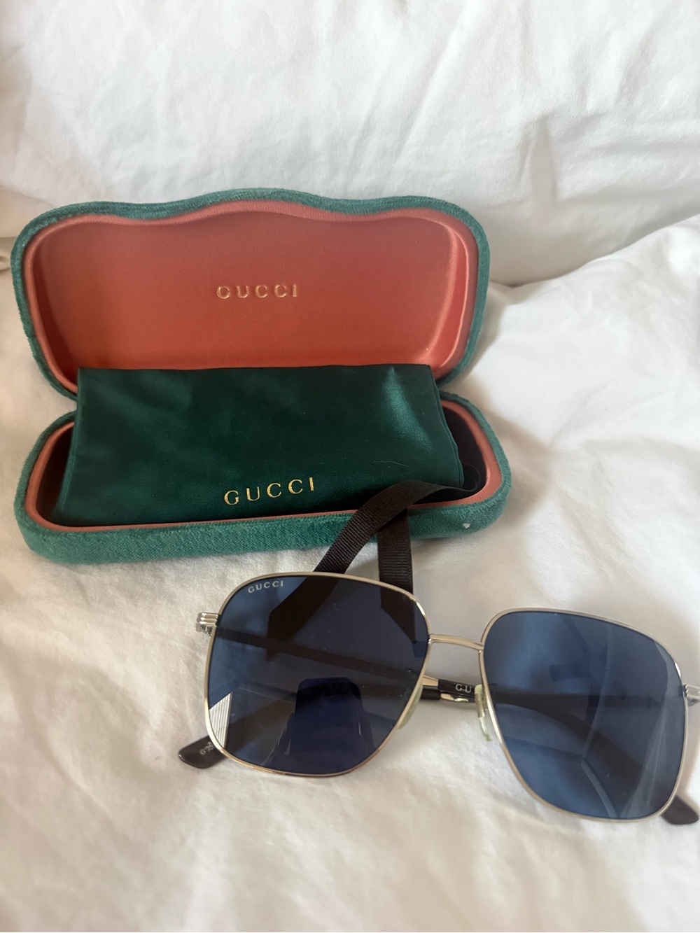 Gucci Silver Metal Frame Sunglasses with Blue Lenses